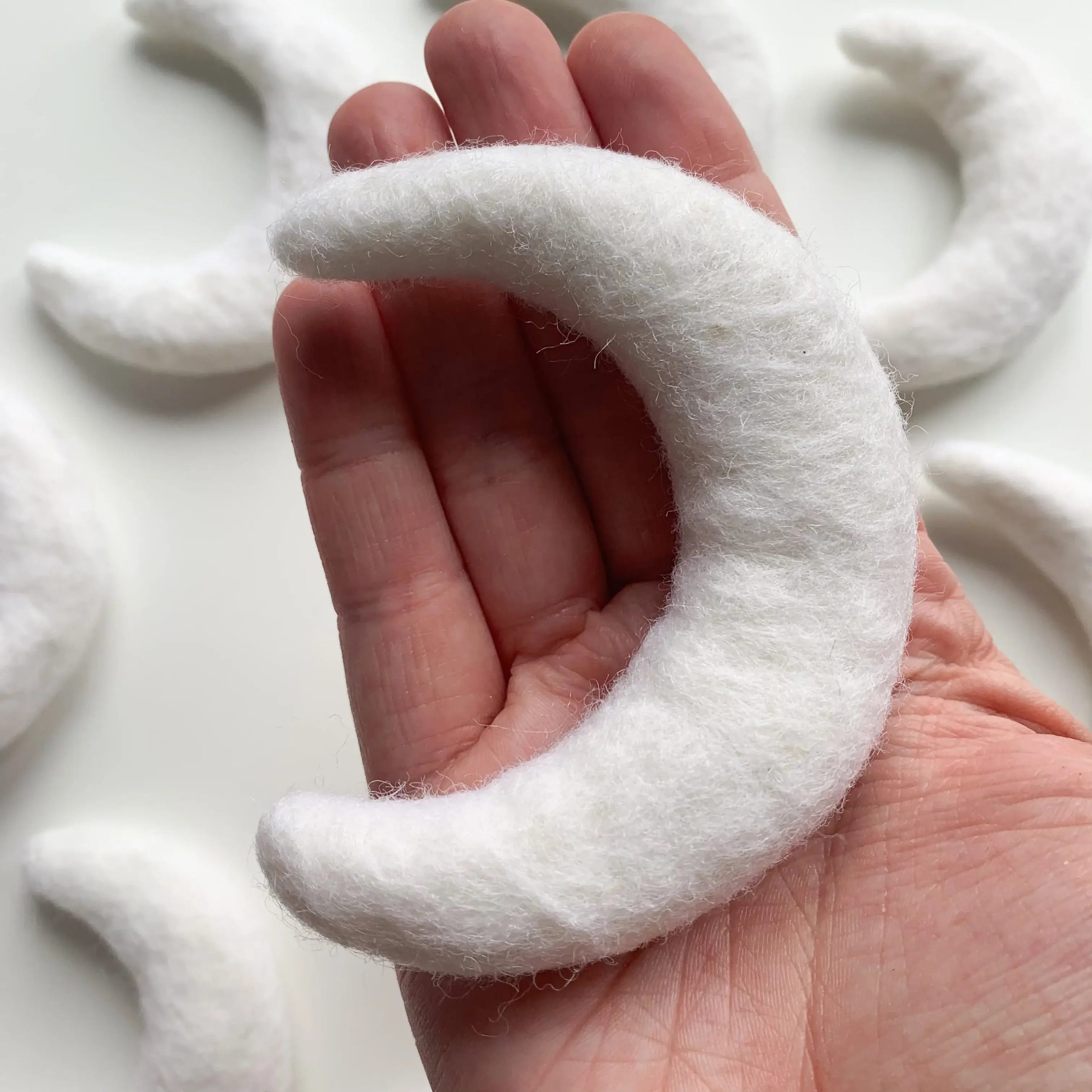 One White Felt Moon