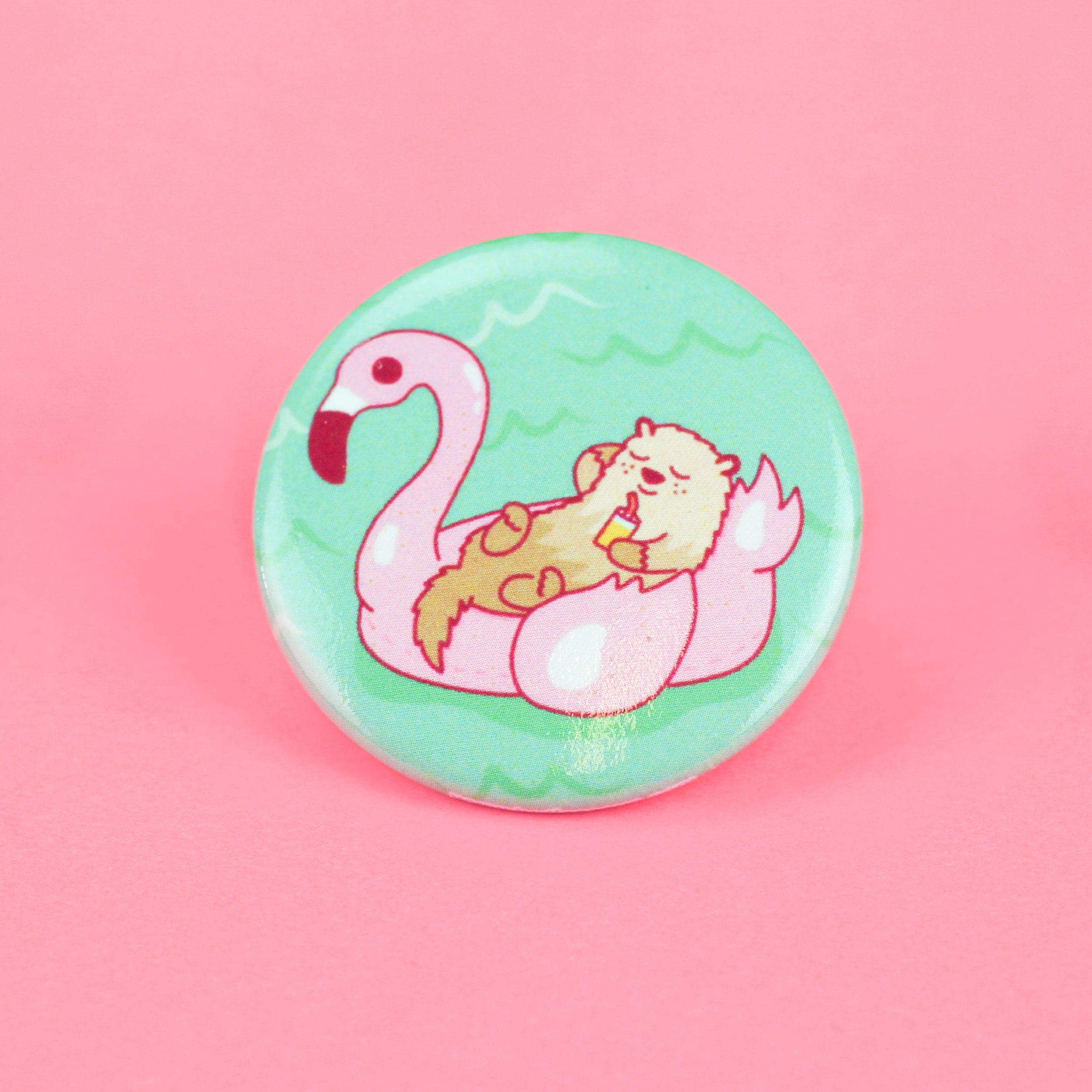 Otter on a Flamingo Pool Float Pinback Button
