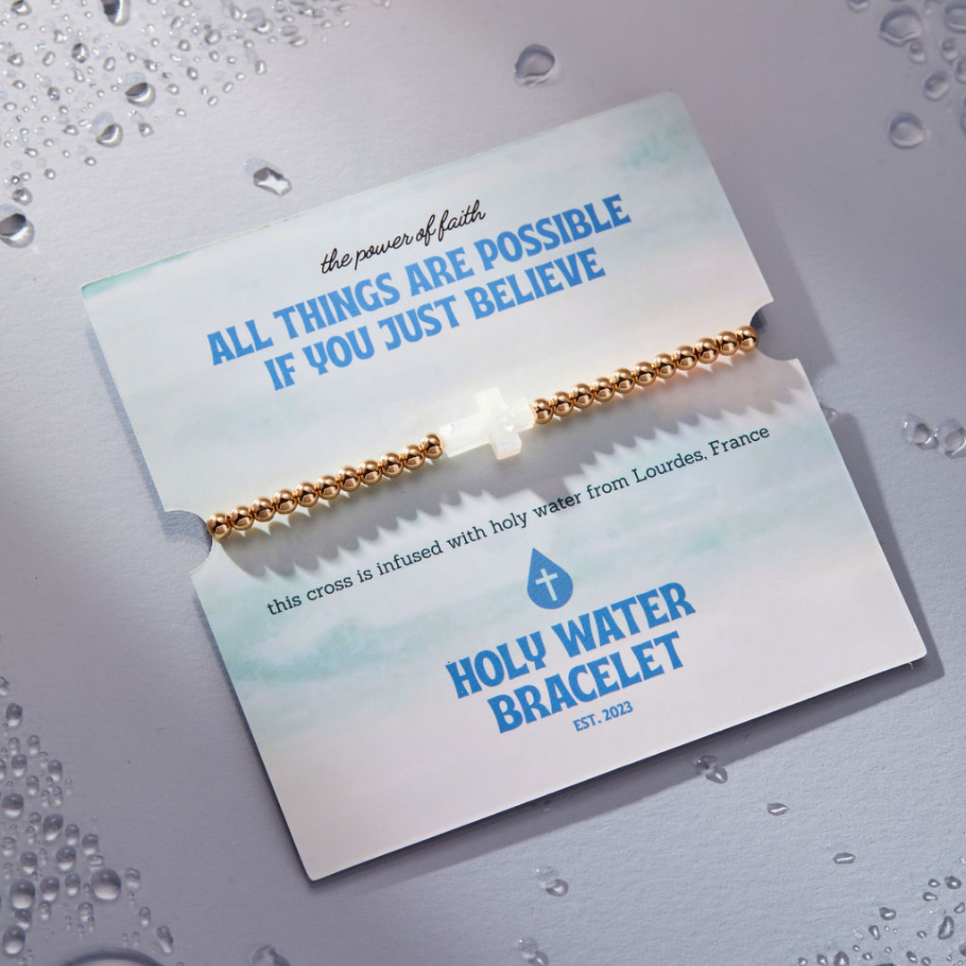 Holy Water Stretch Cross Bracelet in Gold