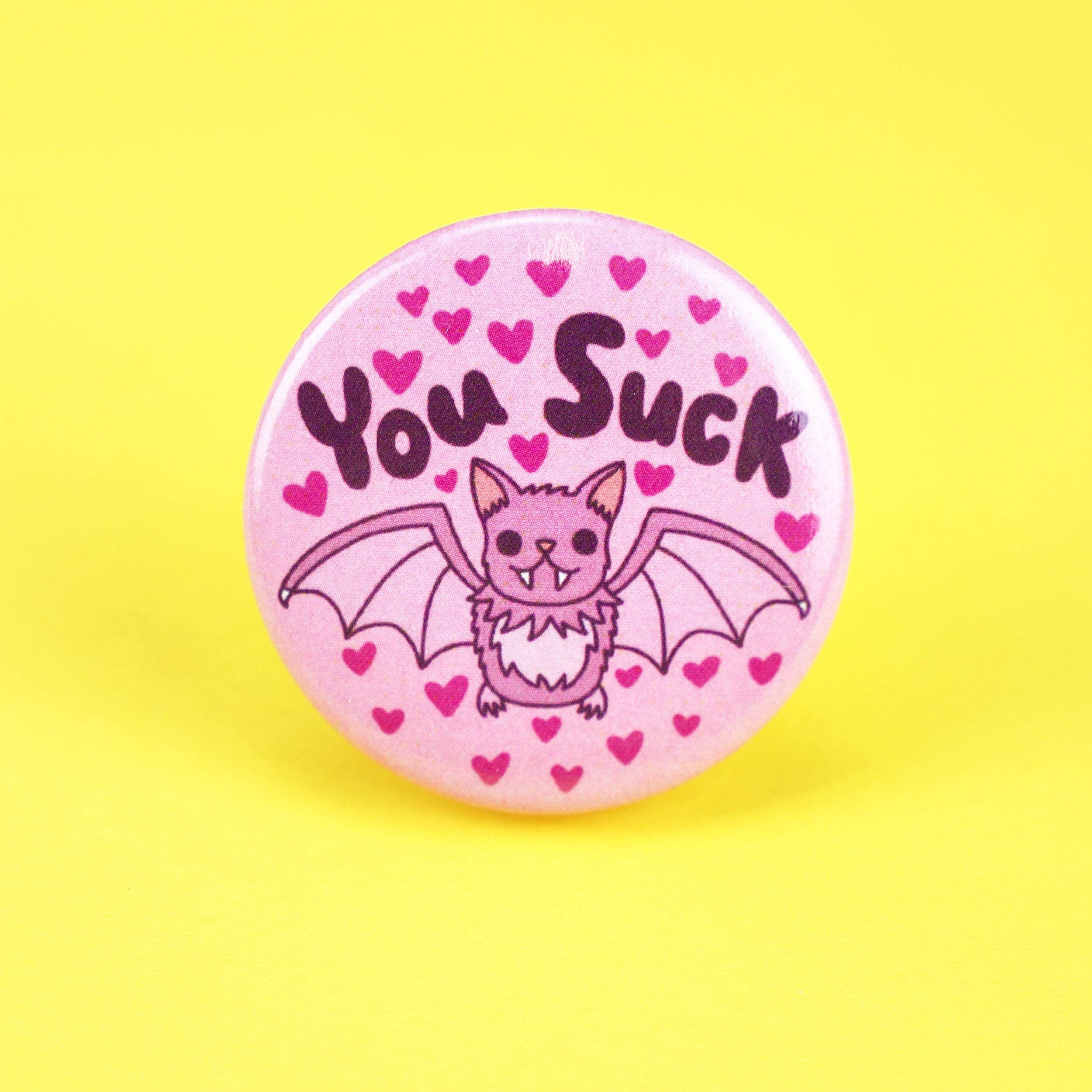 You Suck Bat Pinback Button